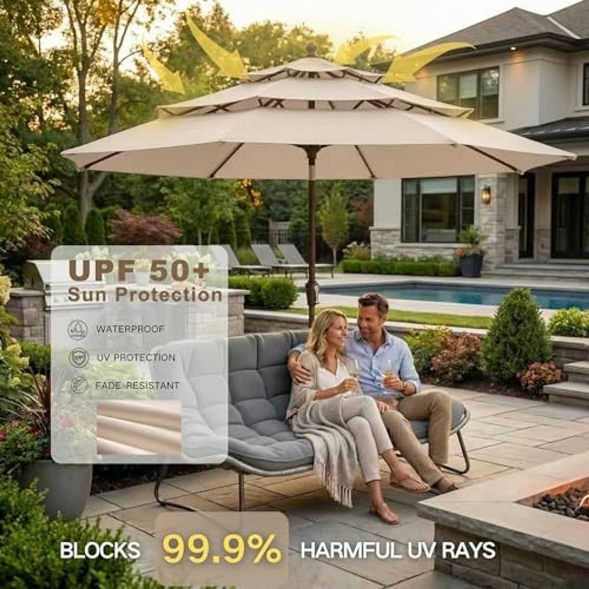 Beige 3-tier patio umbrella over outdoor lounge chairs and table