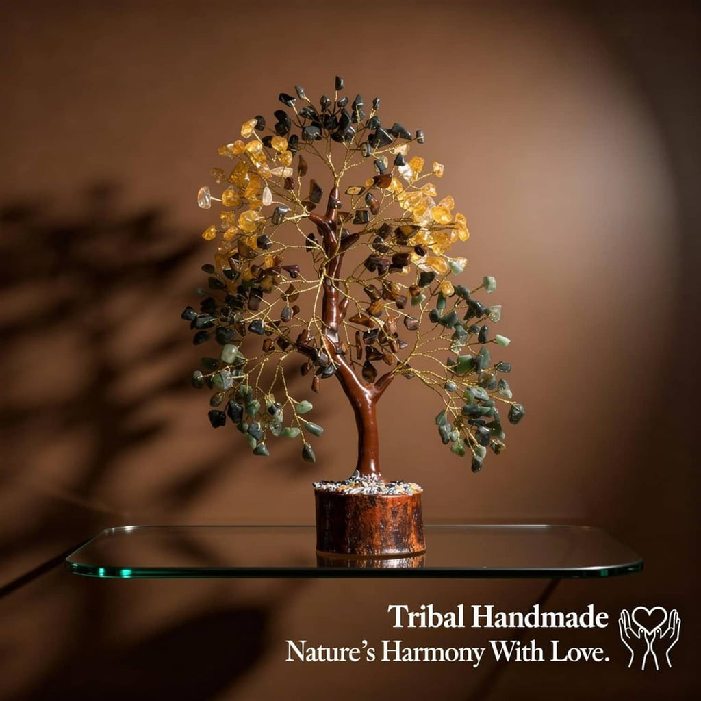 Wire crystal tree with amber and green stones, on round wood base