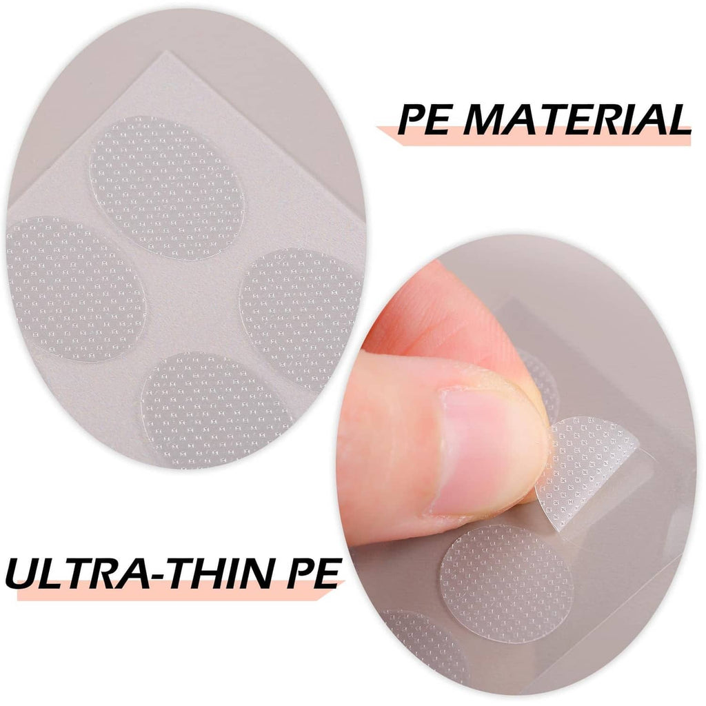 Translucent thin oval earring adhesive sticker pads, lifted from backing
