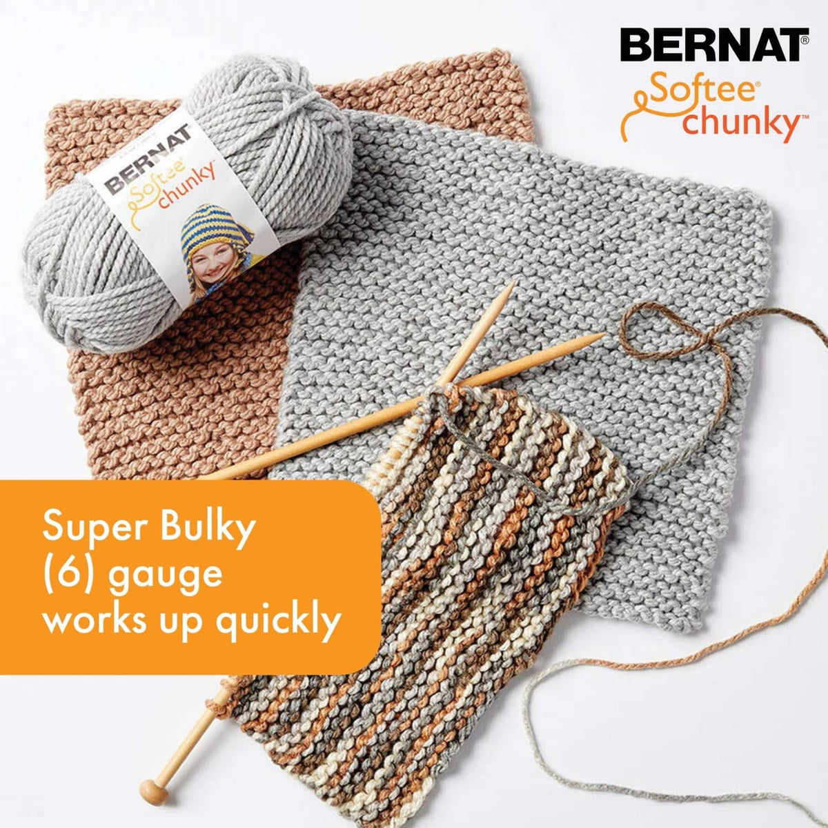 Super bulky chunky yarn and knit swatch with needles and textured stitch pattern