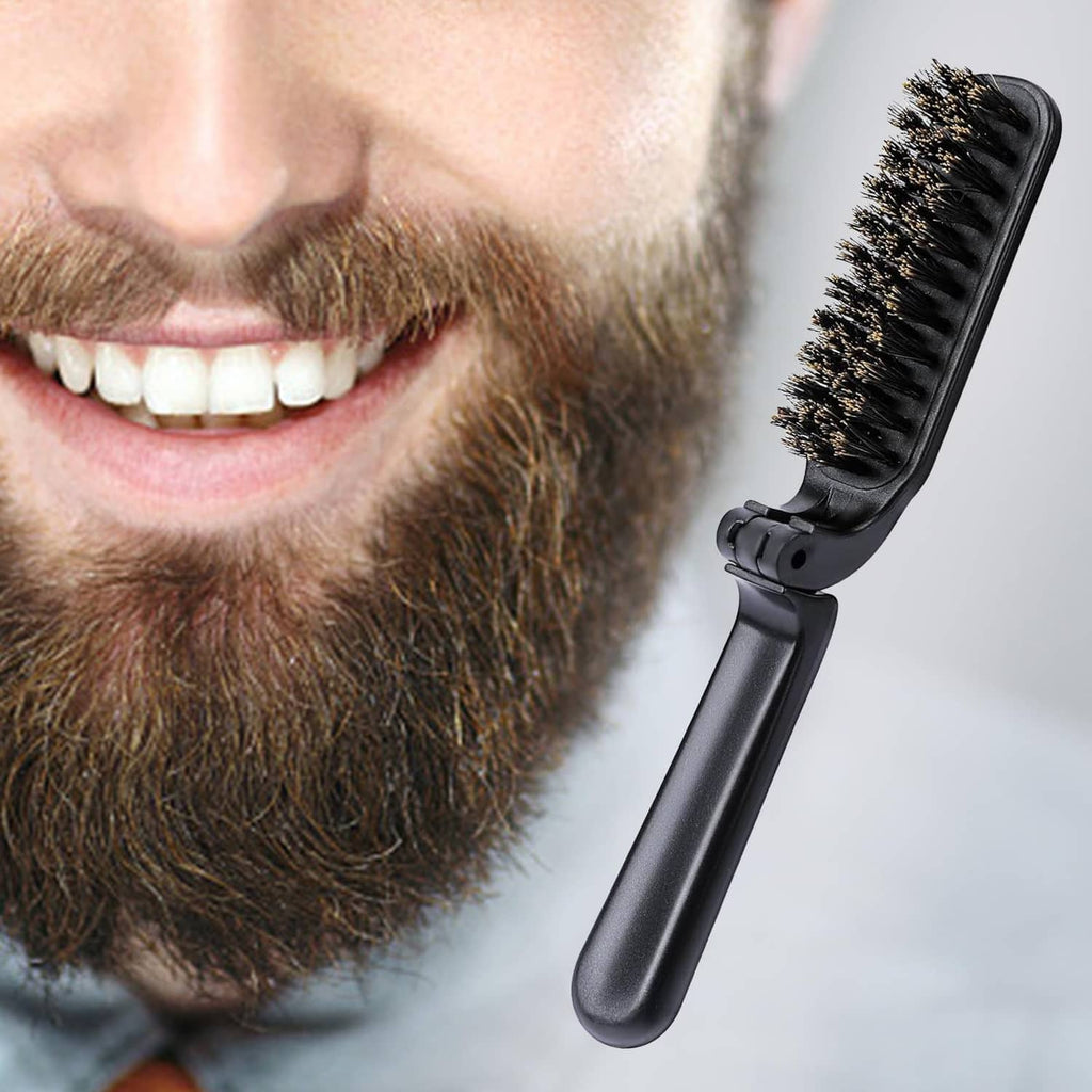 Black mini folding boar bristle hair brush beside beard grooming for styling