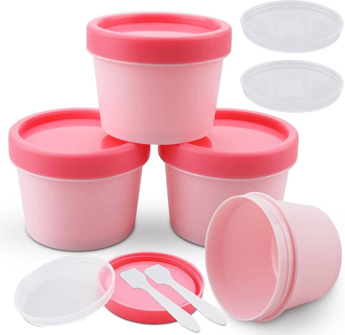 Pink empty plastic cosmetic jars with lids, spare open pot and small applicator