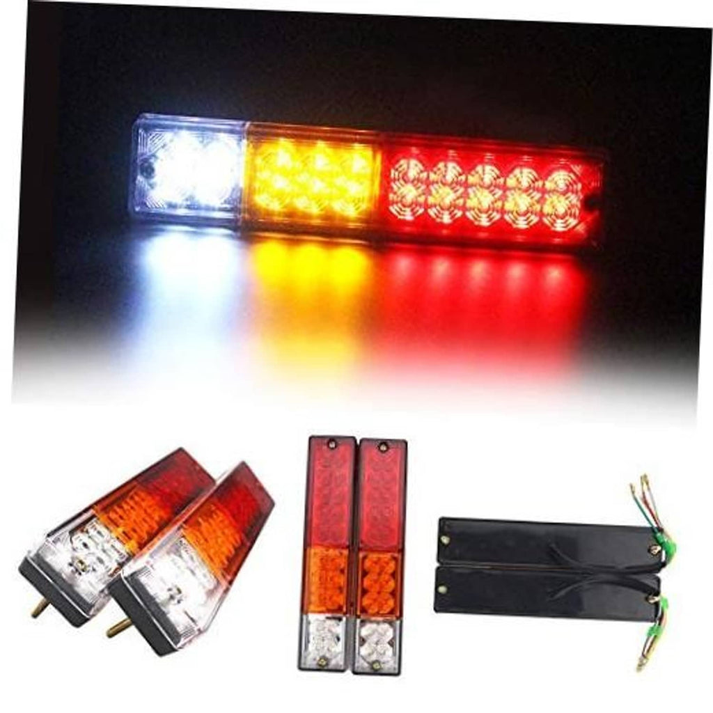 LED trailer tail light bar with left white, center amber, right red LEDs, illuminated.