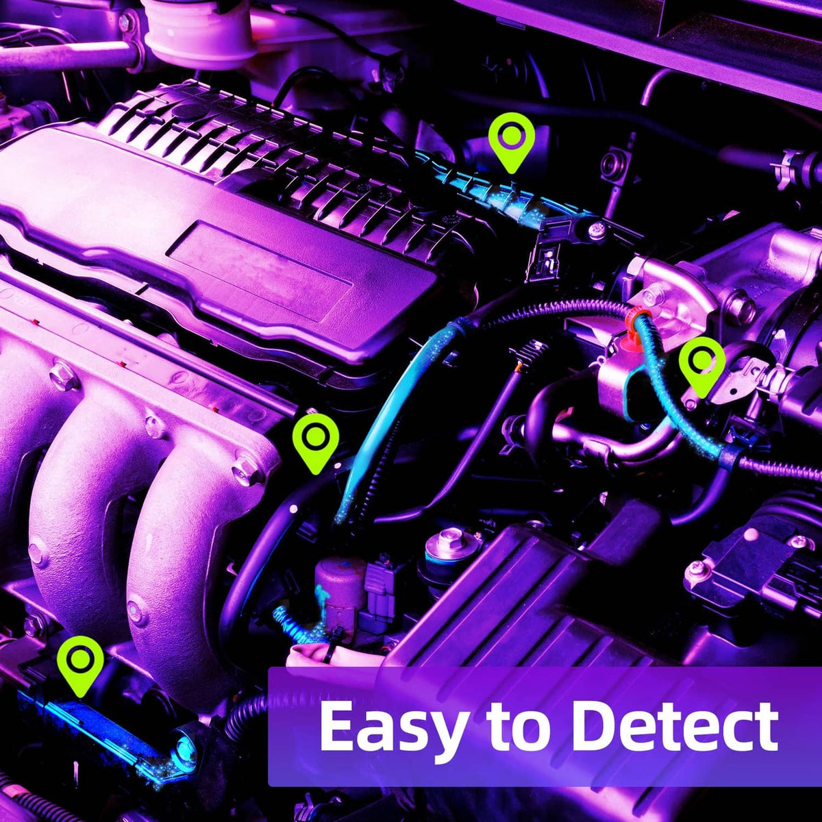 UV leak detector flashlight highlighting suspected AC leak area in engine bay