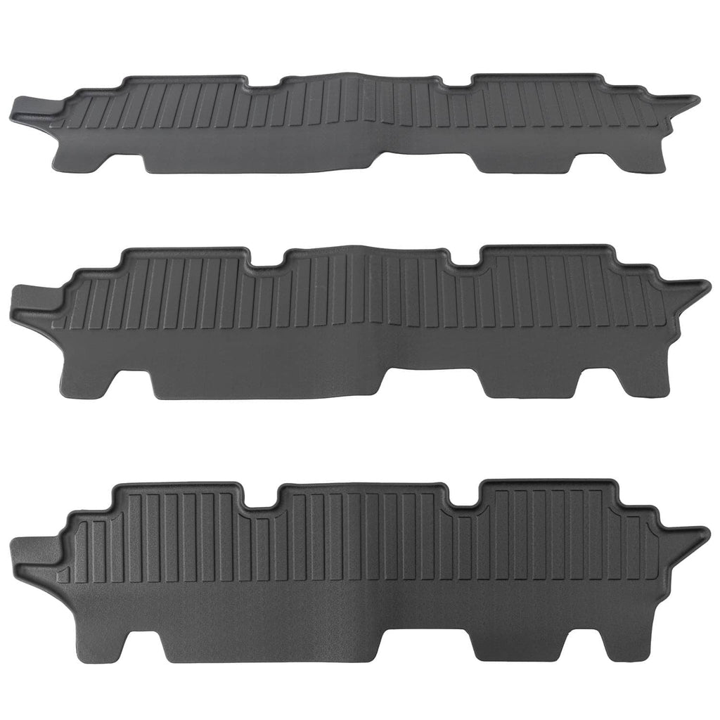 Set of three dark gray rubber floor mats with raised tread ridges and side hooks
