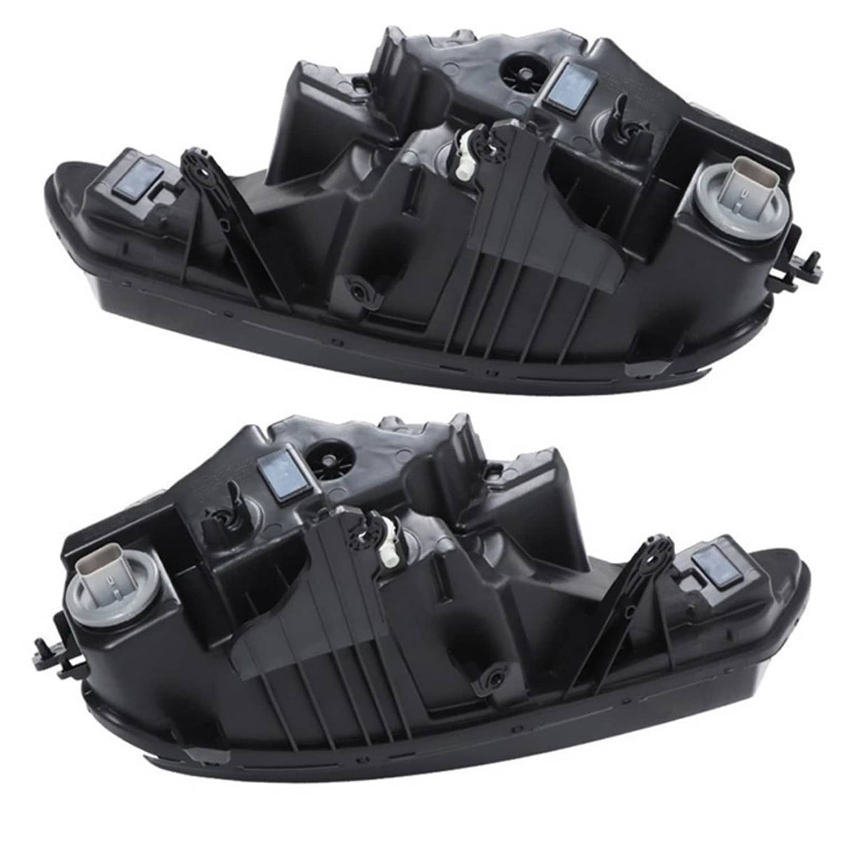 Two black headlight housings with internal projector modules and connector sockets