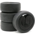 Black RC on-road slick tires with foam inserts, 4-pack set