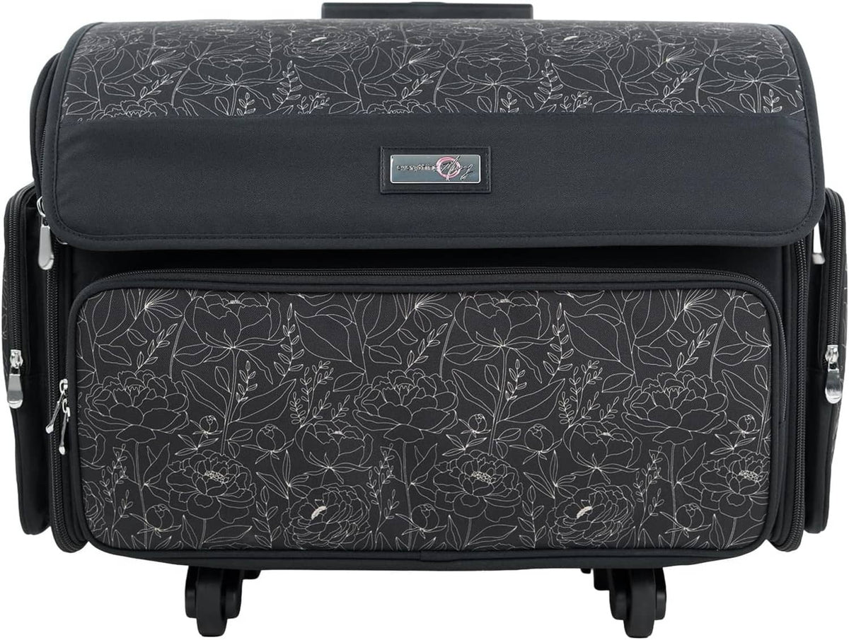 Black sewing machine storage trolley case with leaf pattern, front zipper, side carry handles, 4 wheels