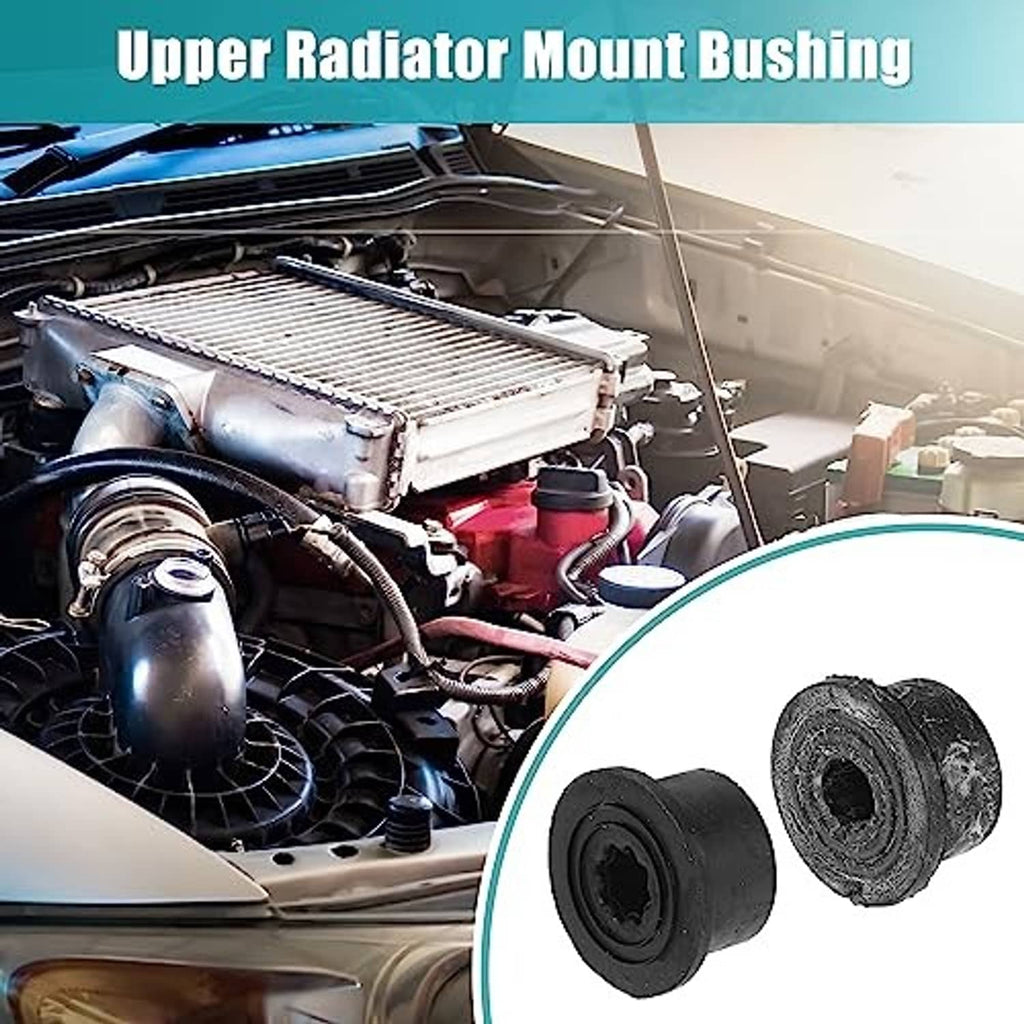 Black rubber radiator mount bushing pair, shown with engine bay; bushings only.