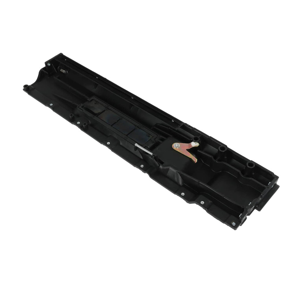 Black interior door handle base with internal compartments and exposed mounting hardware