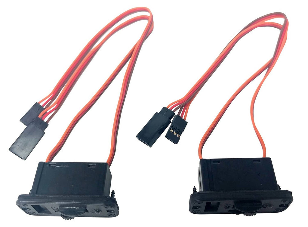 Two black RC on/off switch modules with red/orange and black wire leads