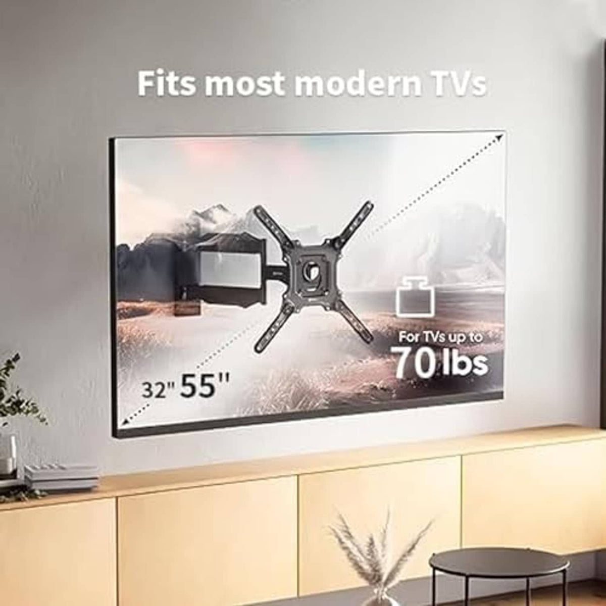 TV wall mount installed on a living room wall with tilting articulated arms