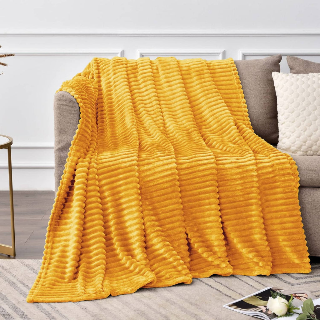 Yellow fleece throw blanket with 3D ribbed jacquard stripe texture