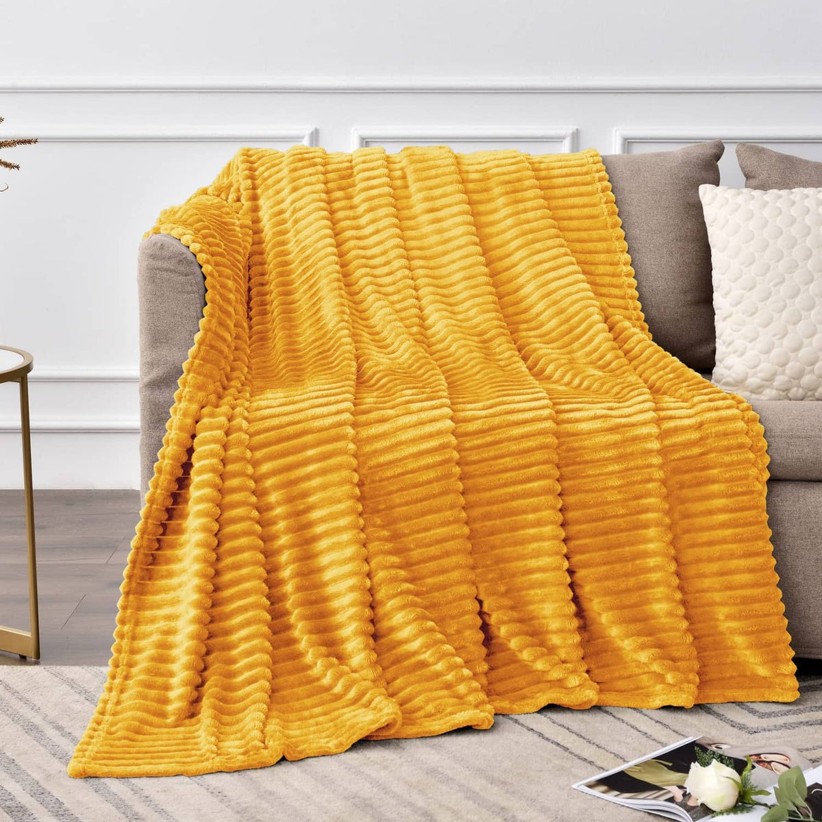 Yellow fleece throw blanket with 3D ribbed jacquard stripe texture