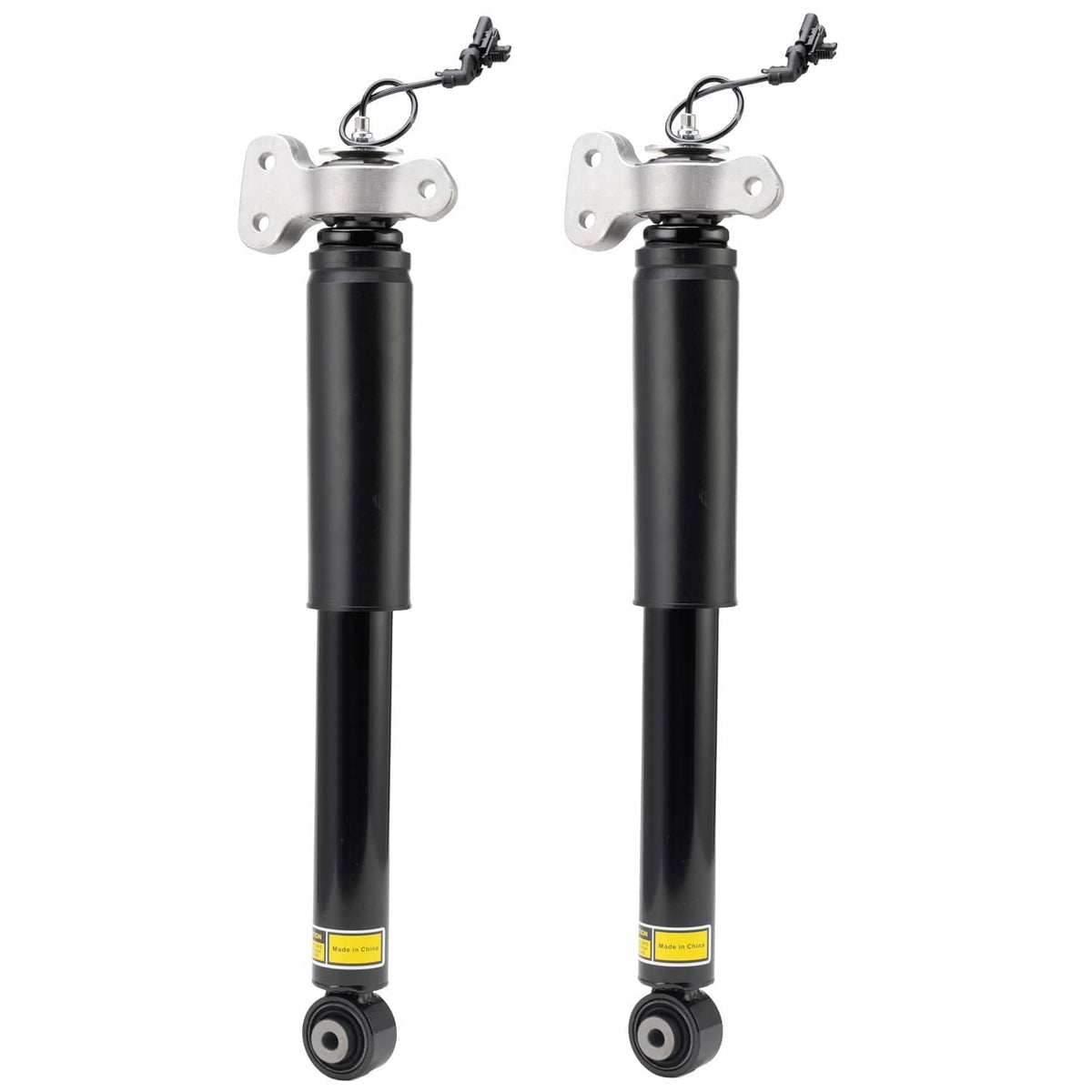 Two rear shock absorbers with black cylinders and silver top brackets, side view