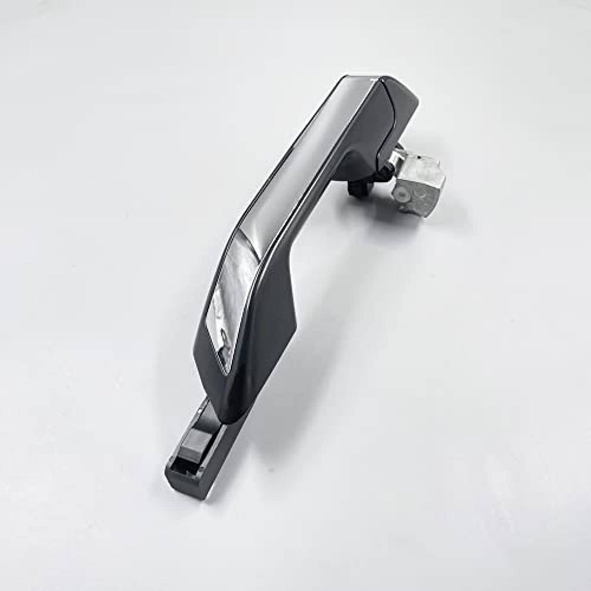 Exterior door handle side view with chrome trim, black pad, and metal mounting