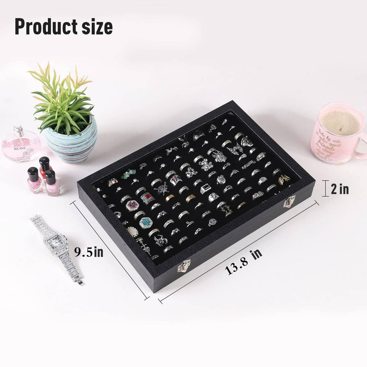Black ring organizer box with open lid and densely arranged ring slots tray