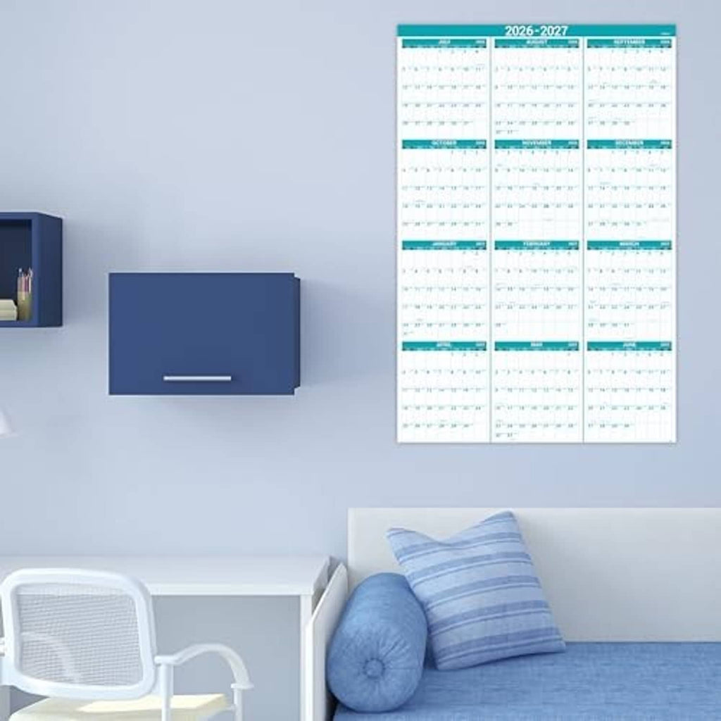Yearly 2026-2027 wall calendar mounted on the wall