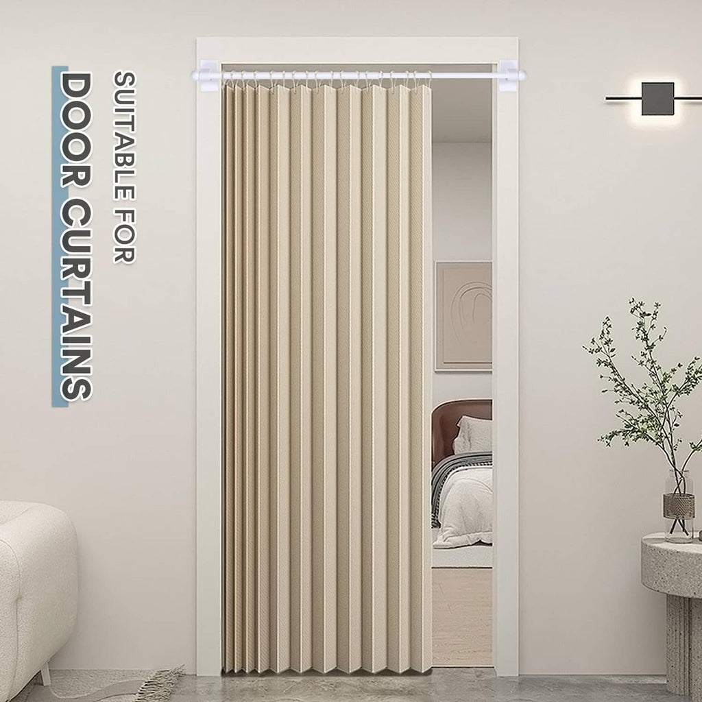 Magnetic curtain rod installed above beige striped curtains on a door