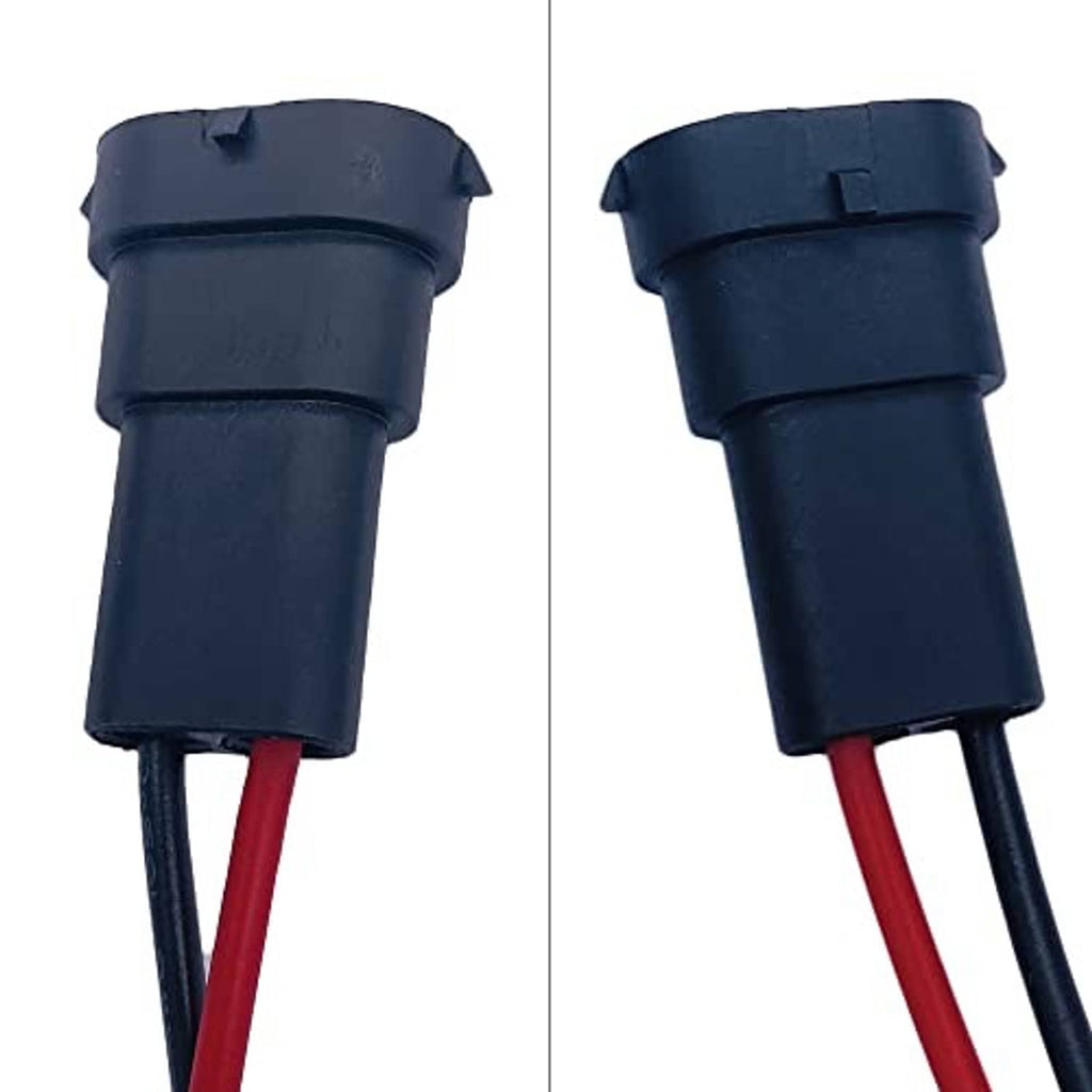 Dark blue headlight pigtail connector housings with attached red/blue wires, end view