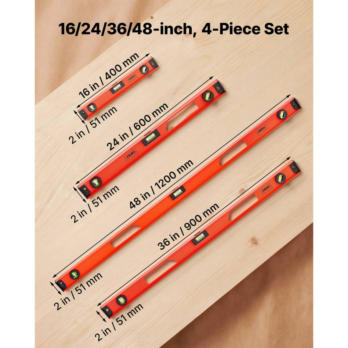 Four-piece orange I-beam magnetic levels on wood with length markings