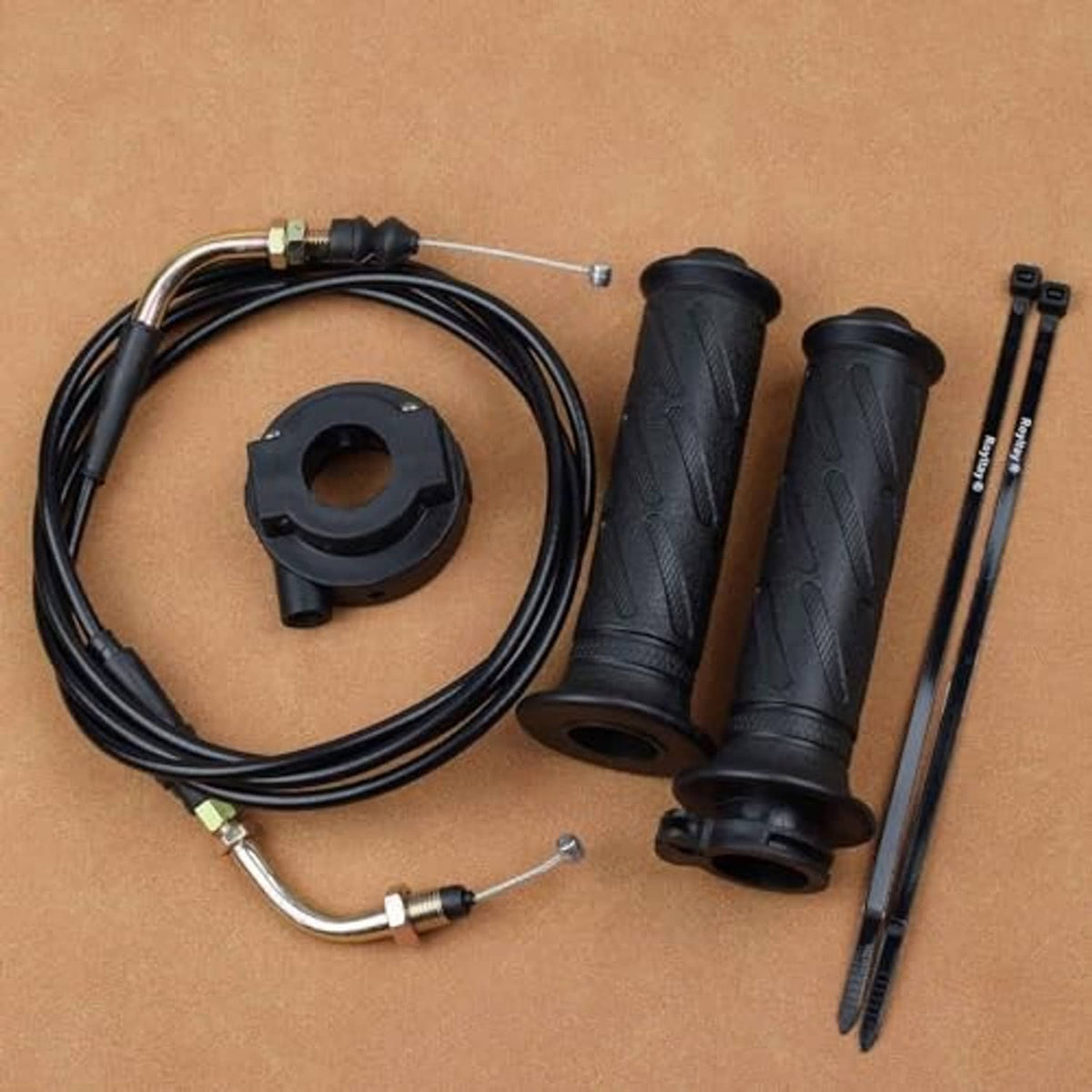 Throttle grip set with black grips, cable, and black mounting clamp pieces