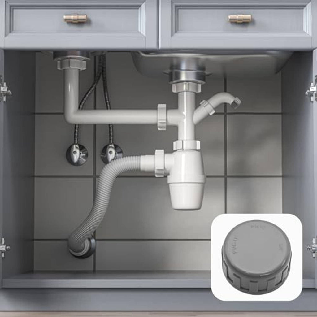 Gray PVC pipe end cap plug inserted on sink plumbing drain for threaded end closure