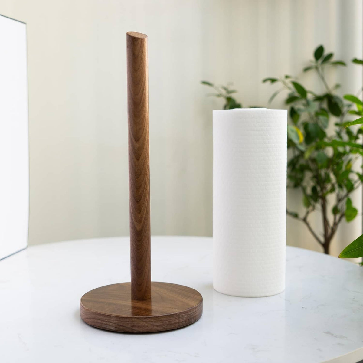 Dark walnut standing paper towel holder with tall pole and white towel roll