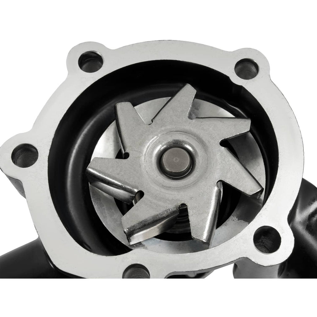 Water pump impeller inside metal casing with blades, circular cover