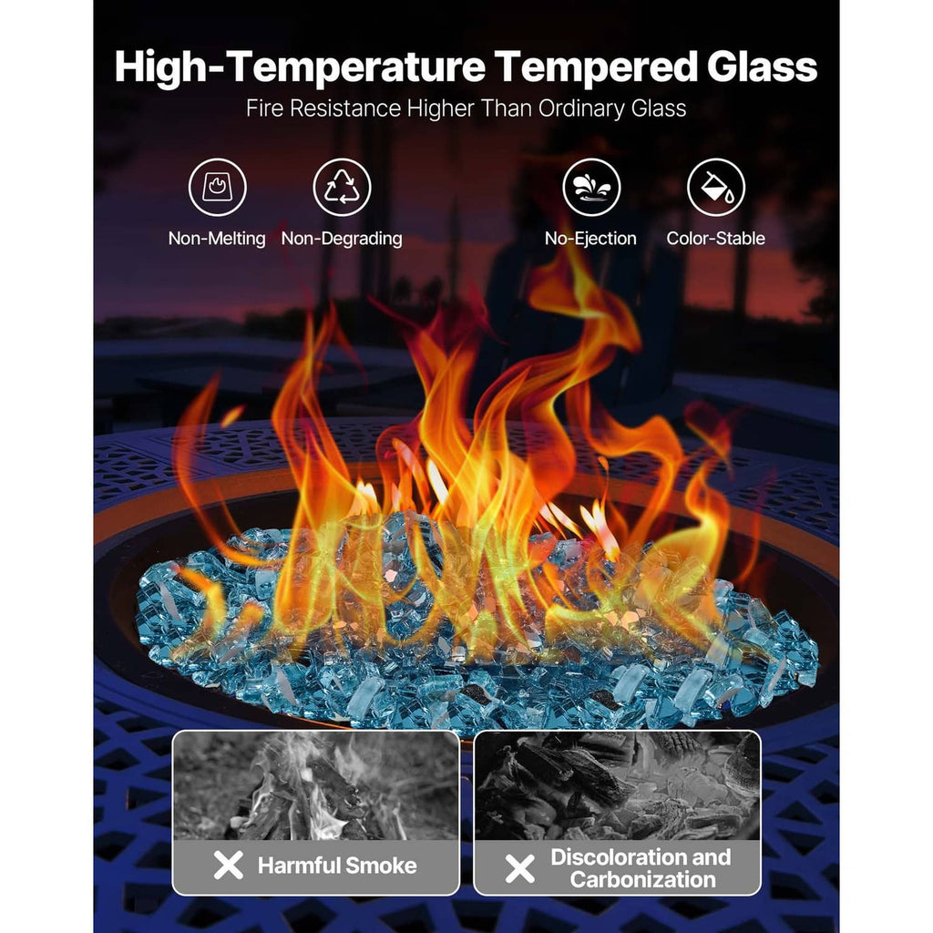 Aqua blue tempered glass stones with bright flames in a circular fire pit
