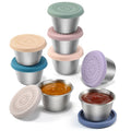Set of small to-go salad dressing containers with stainless steel cups and colored silicone lids