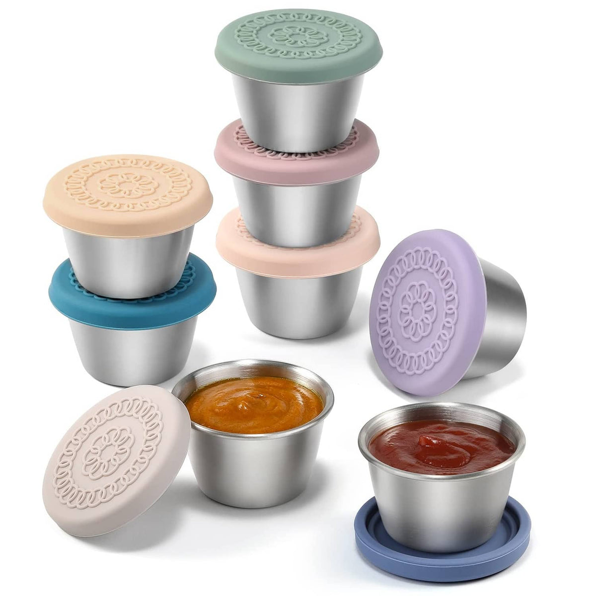 Set of small to-go salad dressing containers with stainless steel cups and colored silicone lids