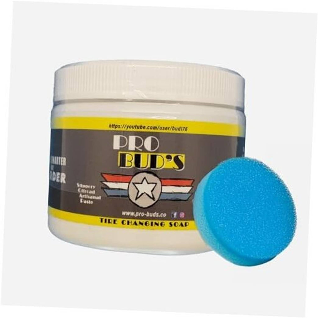 Tire changing soap jar with screw-top lid and blue applicator sponge