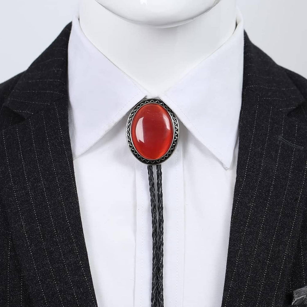 Bolo tie worn on shirt: black cord with red oval stone pendant, silver frame