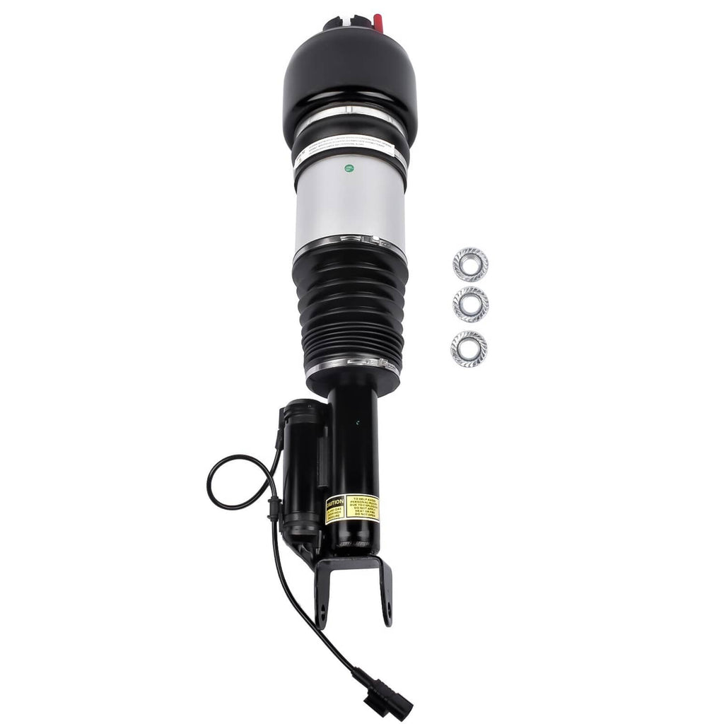 Air suspension strut top view with black bell housing, silver tube, coils, and wiring connector