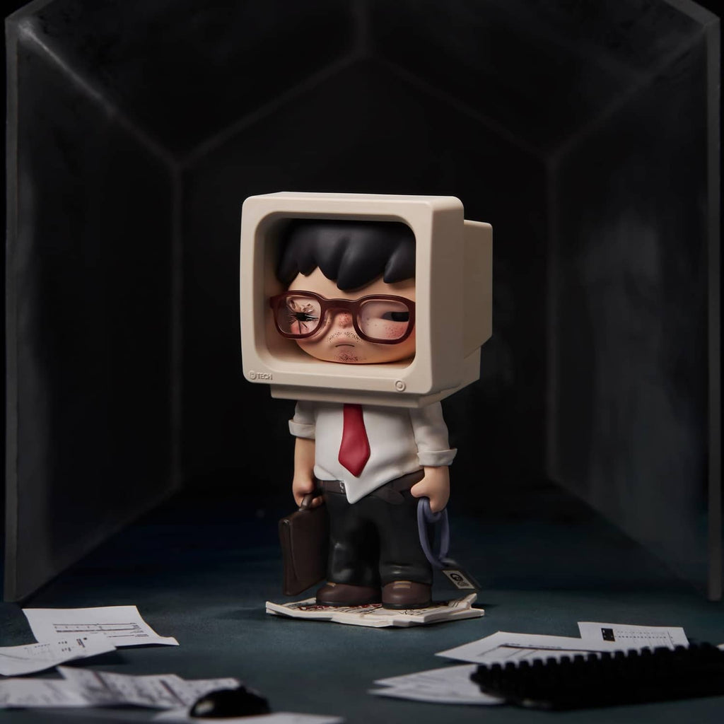 Tamed Hirono figure in goggles and a red tie outfit, standing on a small base