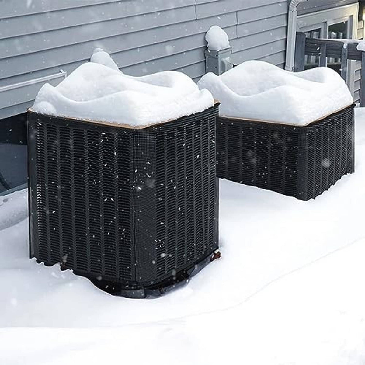 Square air conditioner cover with dark mesh sides and snow on the brown top