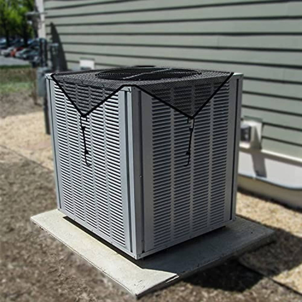 Outside AC unit cover with dark mesh vinyl and black strap fasteners outdoors