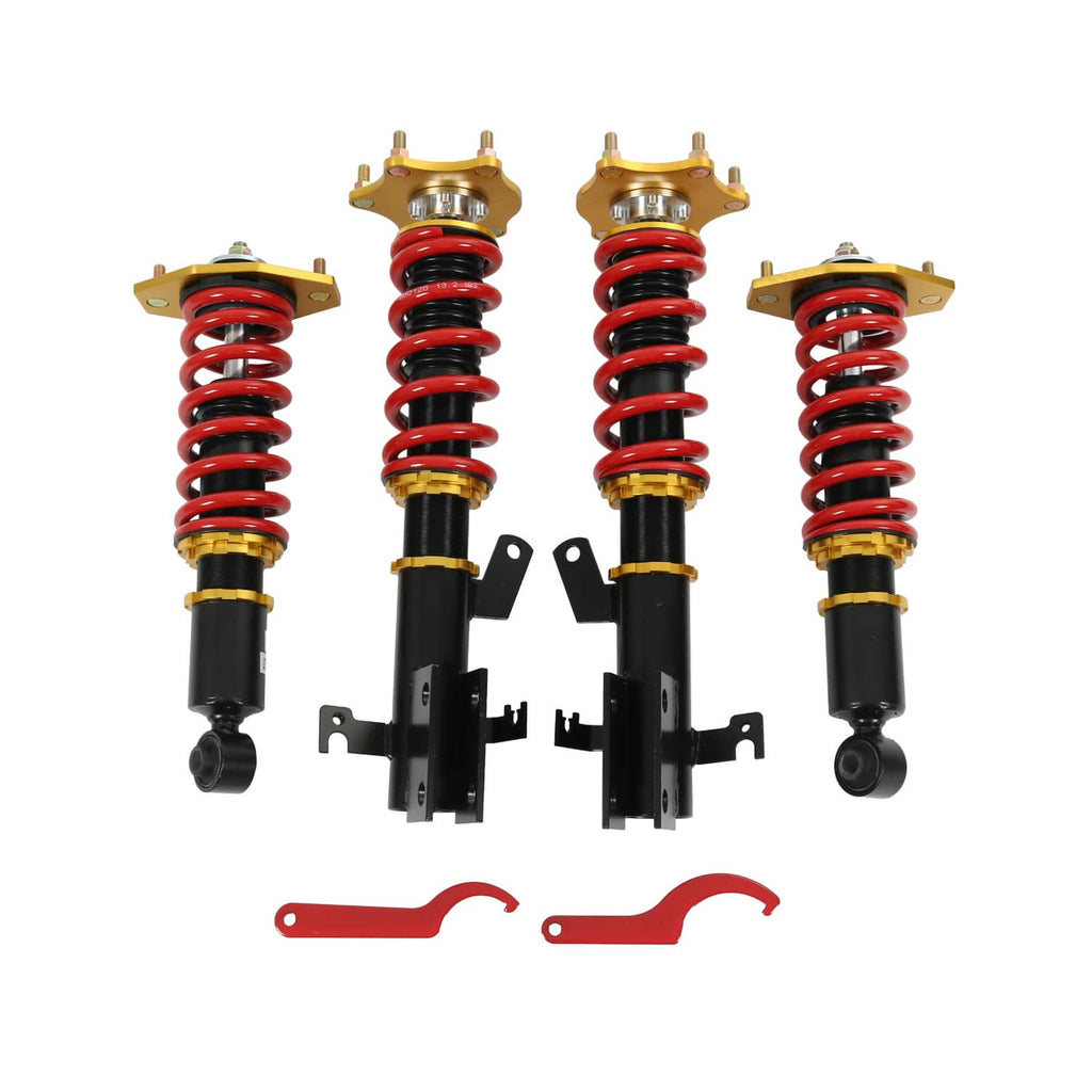 Coilover suspension kit with four adjustable shocks, red springs, black bodies, gold tops
