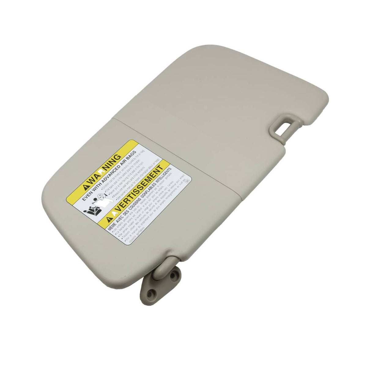 Light gray driver-side sun visor with warning label and pivot bracket