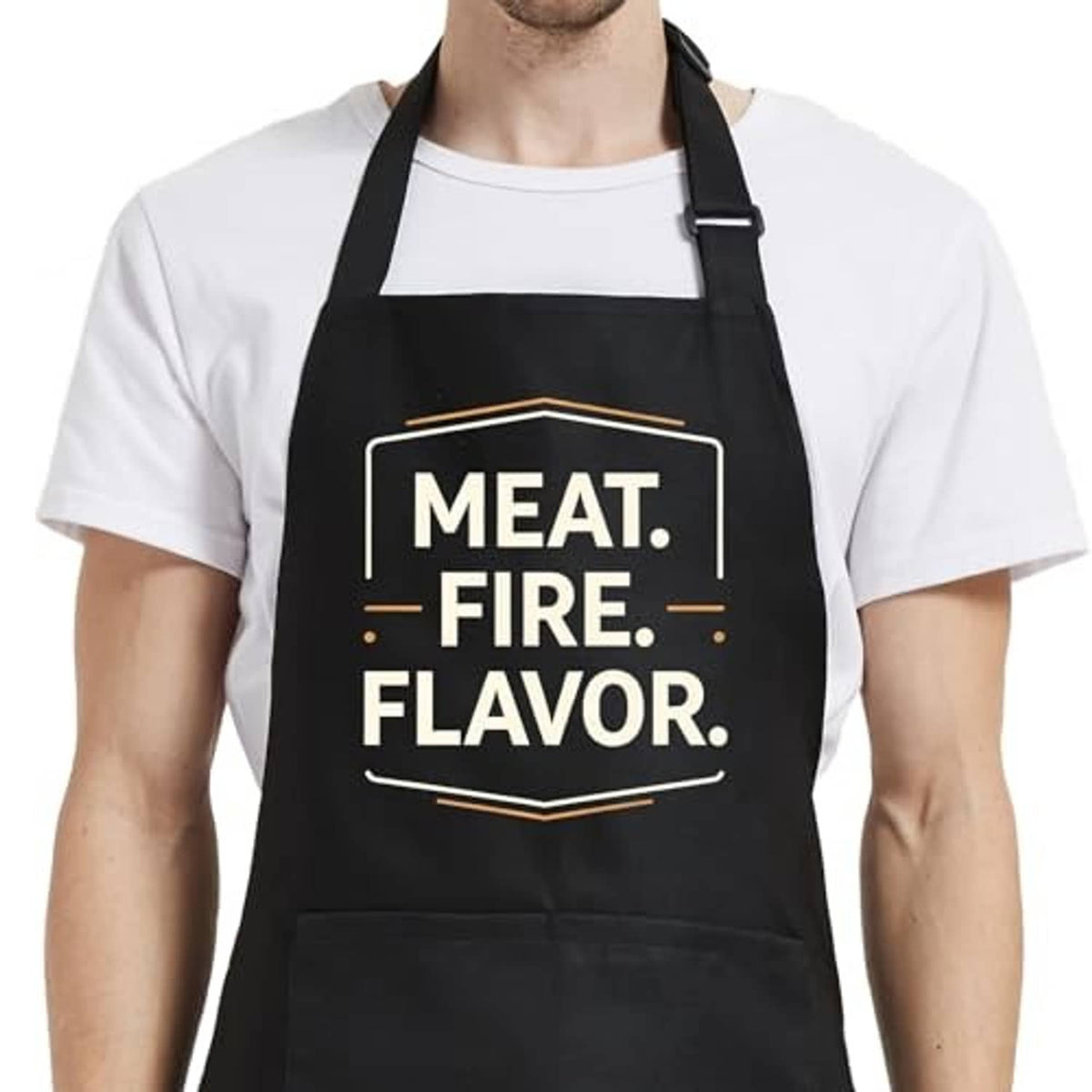 Black bib apron with “MEAT. FIRE. FLAVOR.” print and adjustable neck strap.