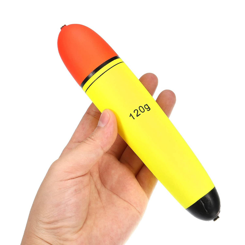 120g slip bobber held in hand, red tip, yellow float body, black bottom