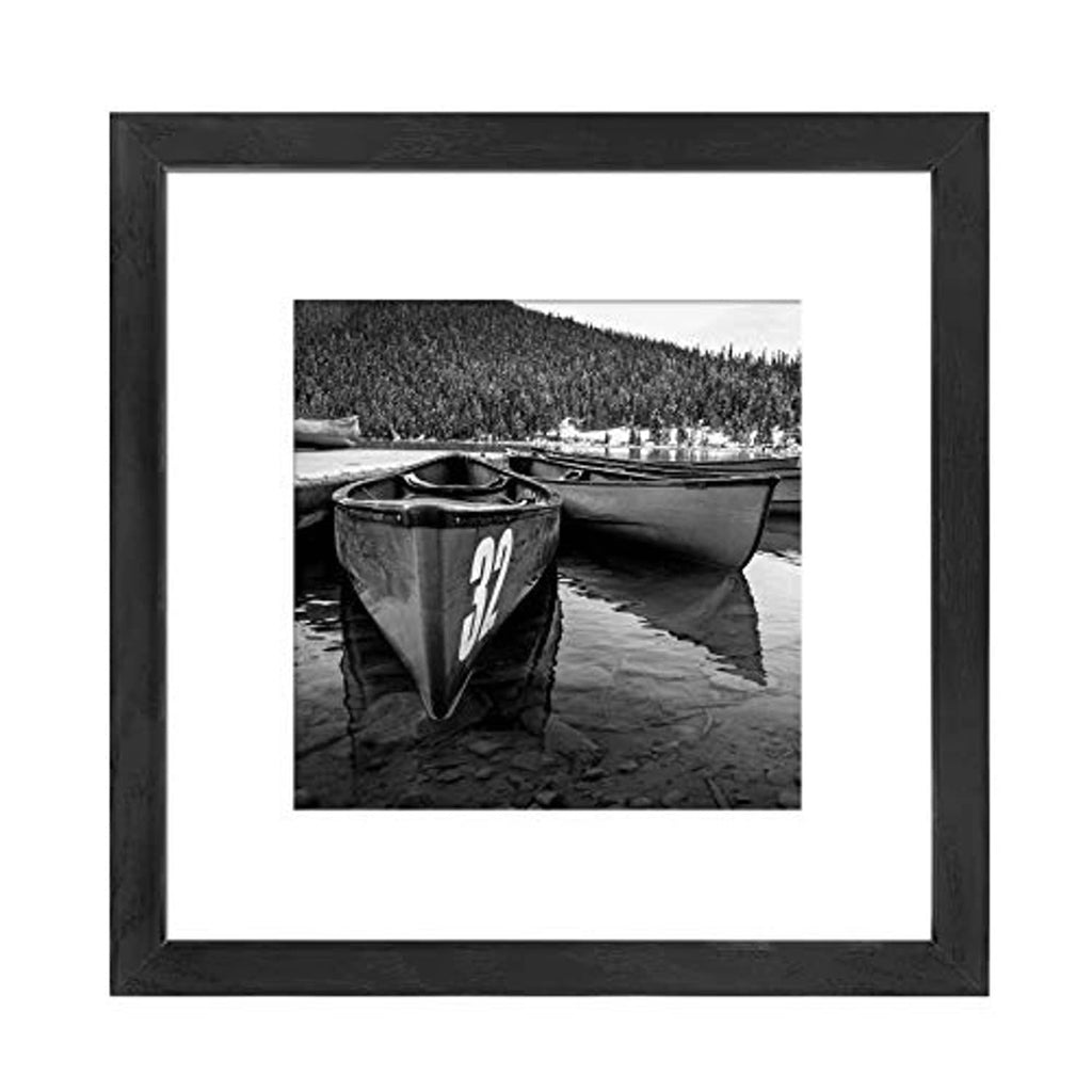 Black 12x12 picture frame with white mat and centered black-and-white photo.