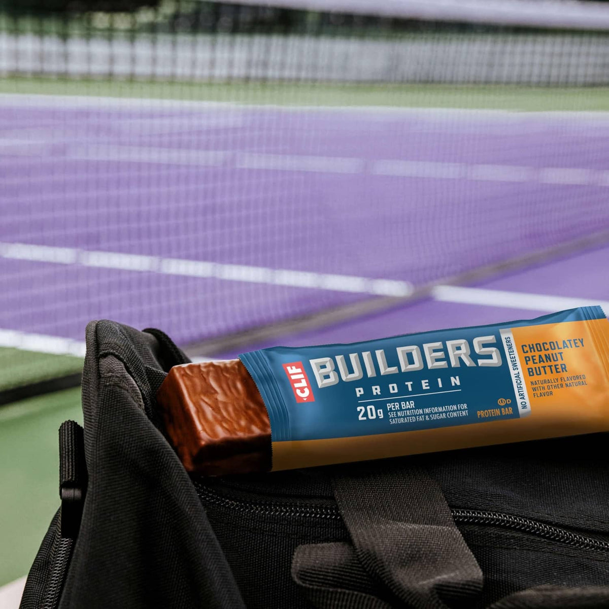 CLIF BUILDERS protein bar pack tucked in an open gym bag