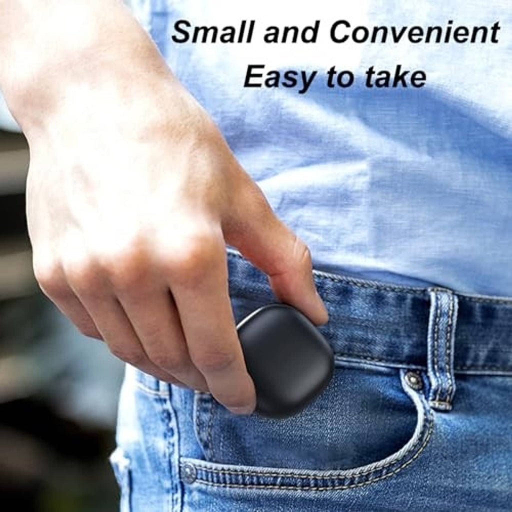 Black charging case held in hand for smart ring charging