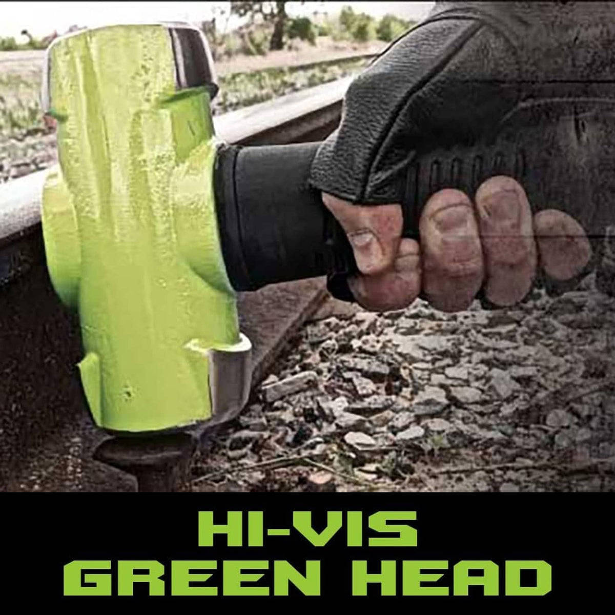 Neon green soft-face sledge hammer striking ground, glove and black handle visible