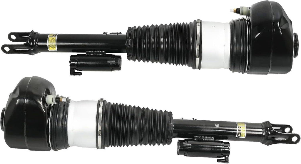 Front air suspension shock strut pair, black springs and white cylinders, side view