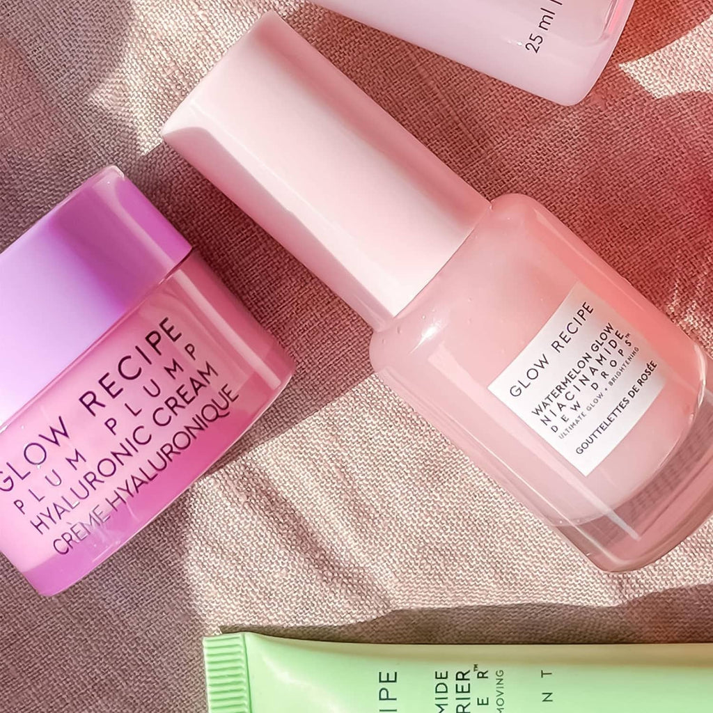 Glow Recipe travel-size cream and toner bottles in pink and green with labels