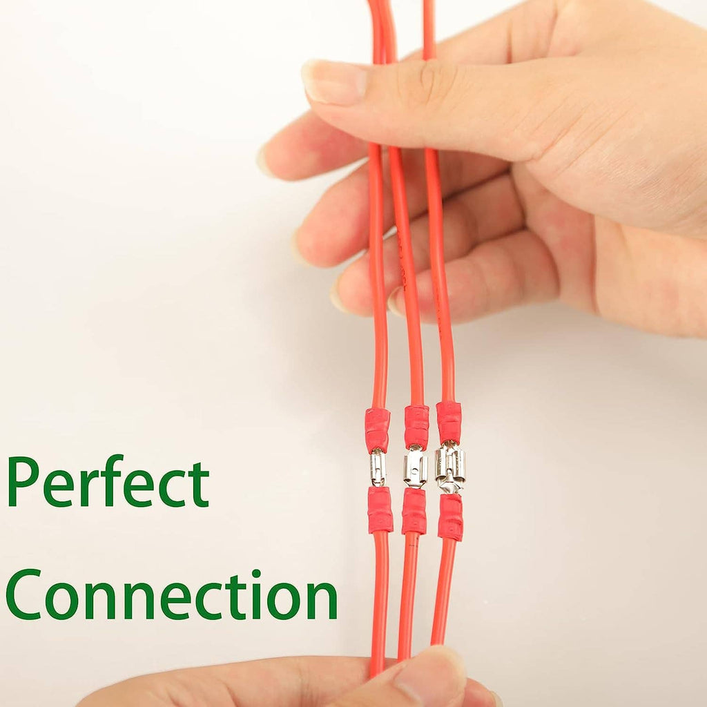 Hand holding red insulated wire connectors with crimp terminal ends