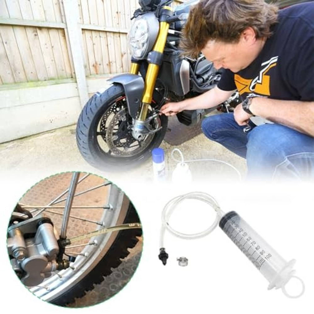 Motorcycle brake bleeding using syringe and clear hose, with included fittings